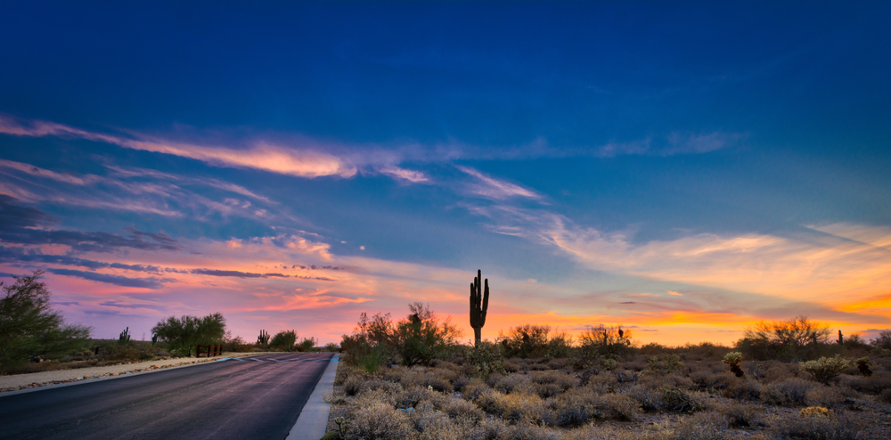 a desert sunset on a road in Scottsdale arizona