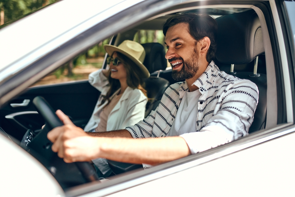 young couple in the car