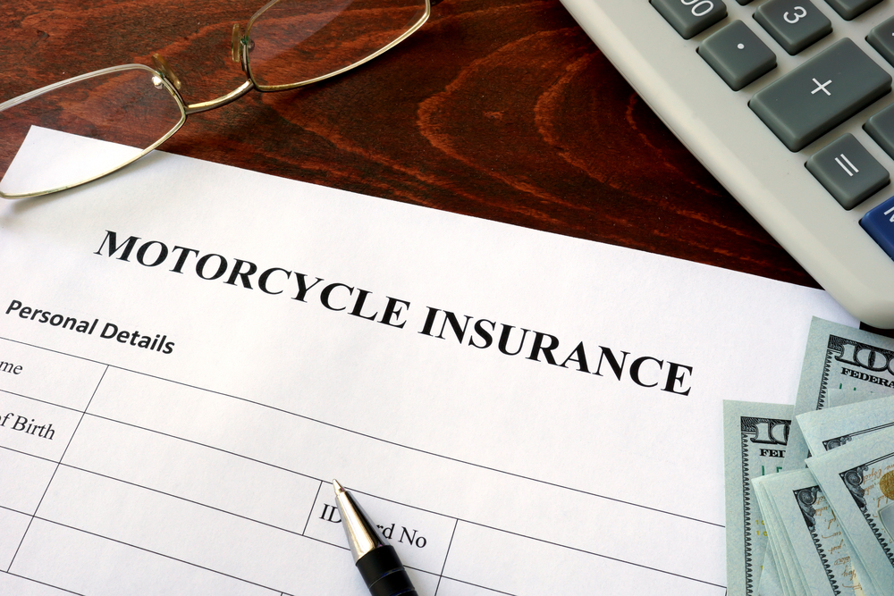motorcycle insurance form with pen