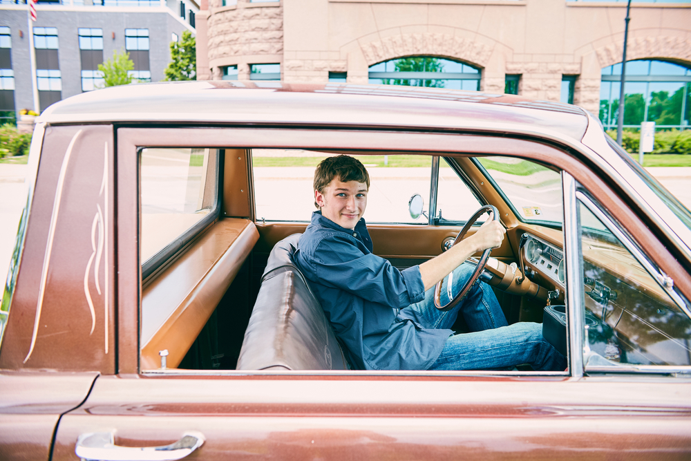 college student driving old truck